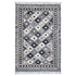 Patterned rug with geometric design on a white background