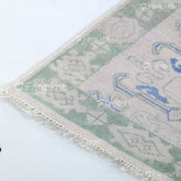 Textured rug with geometric pattern on a white background